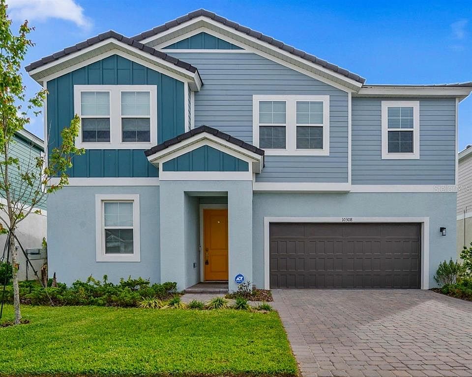 10308 Fieldstone Myrtle Way exterior with blue-gray siding and a bright yellow front door