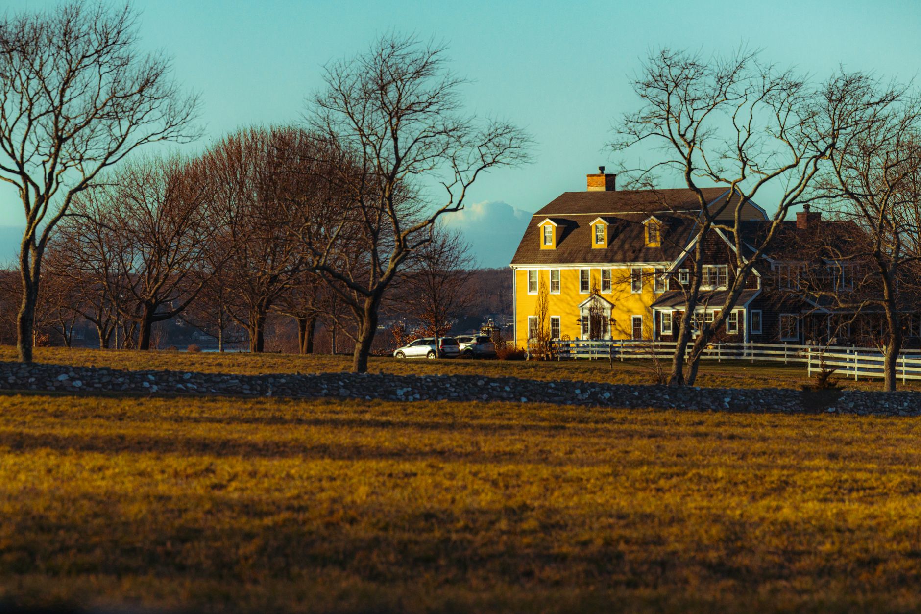 New England country home in warm evening light
