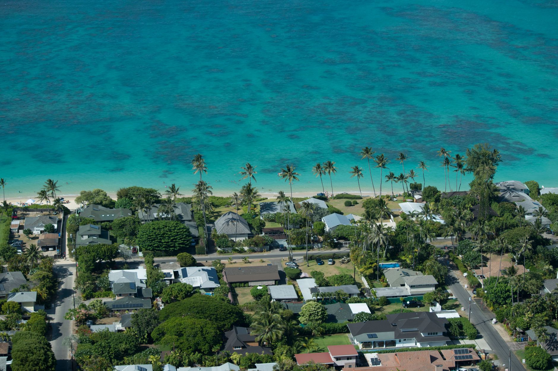 Aerial view of Kailua homes and turquoise coastline