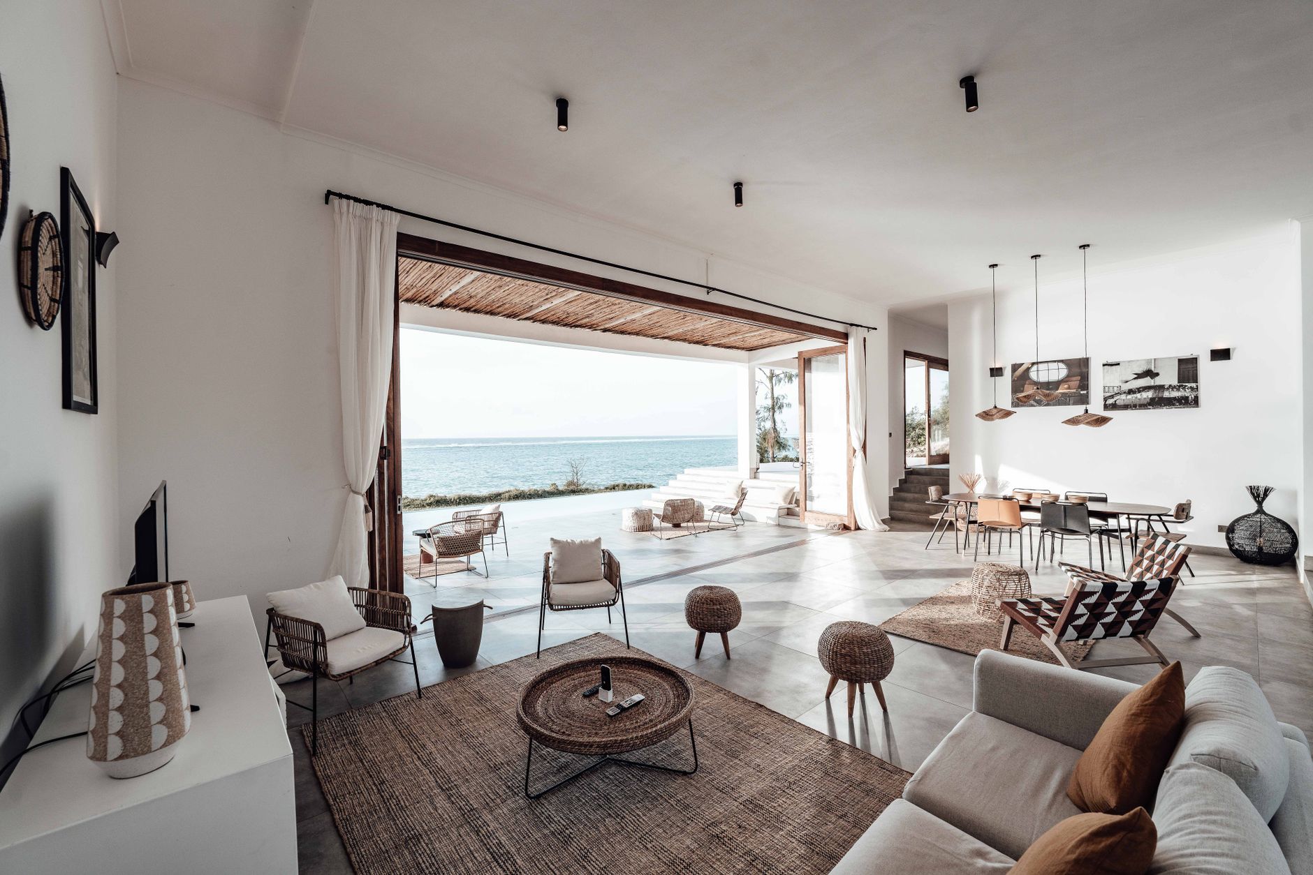 Modern Hawai‘i living space opening to an ocean view