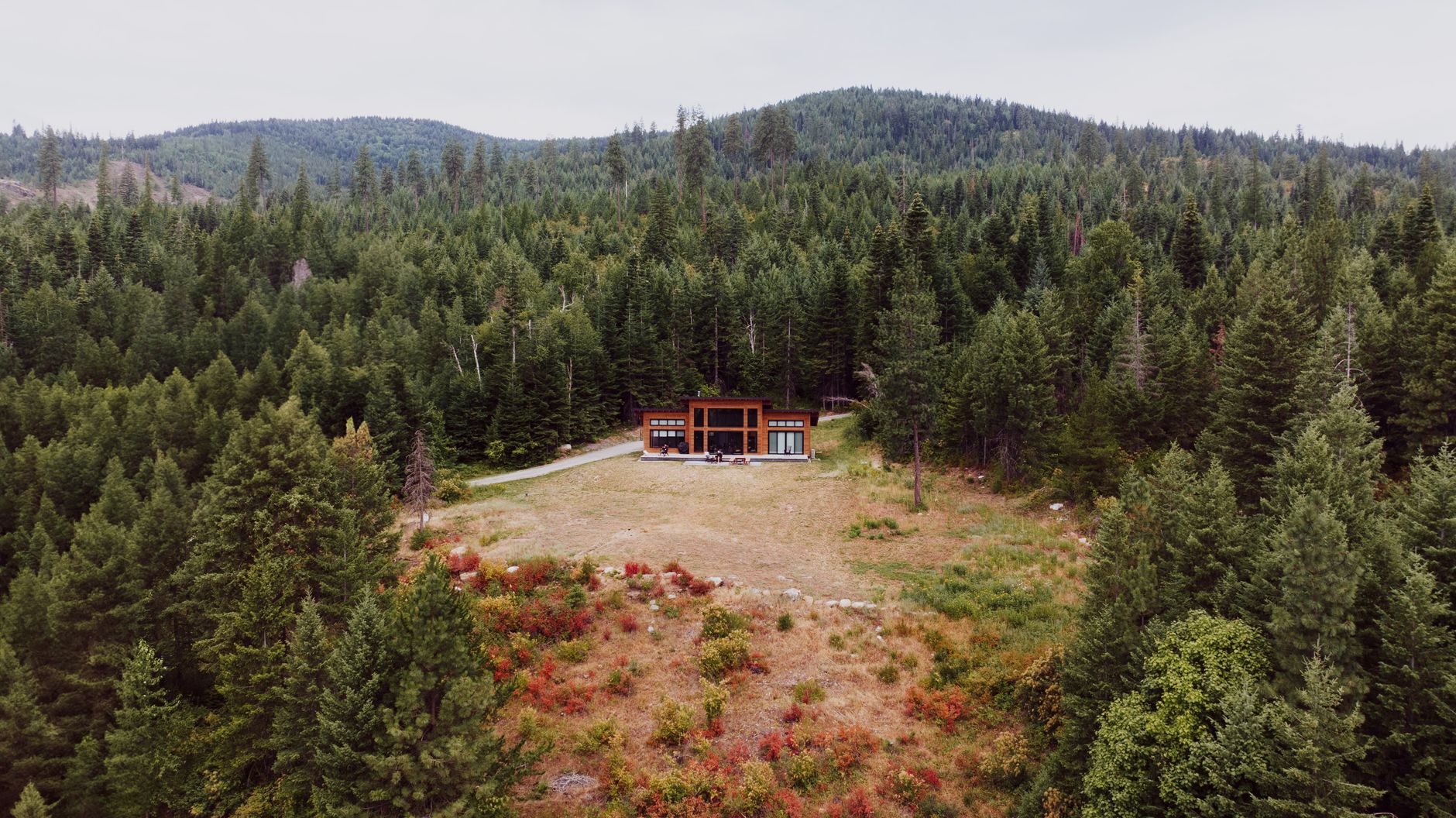 Modern cabin surrounded by North Idaho forest