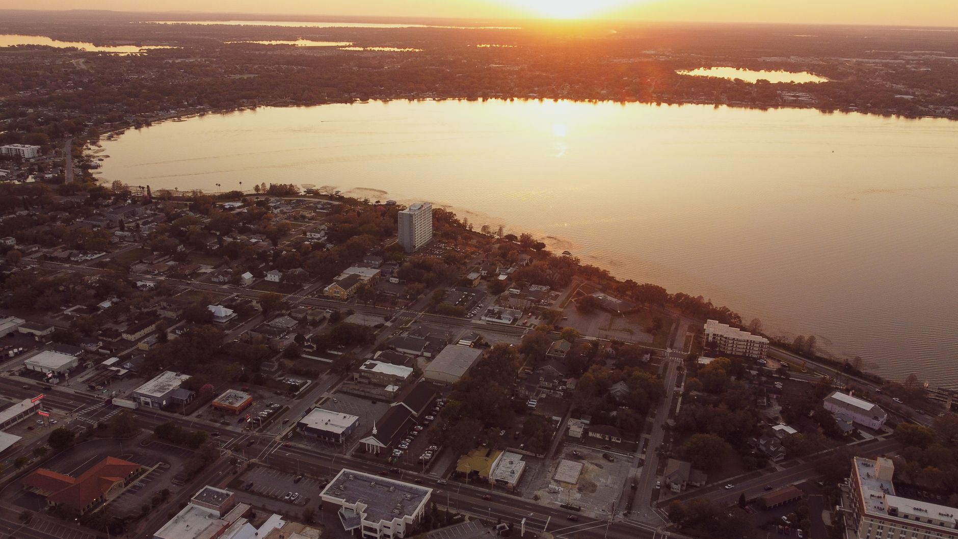 Aerial view of Coeur d’Alene beside the lake at sunset