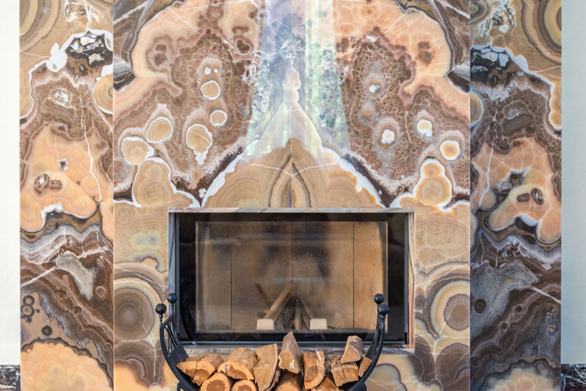 Marble fireplace detail in a refined residence